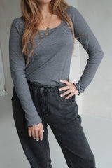 long-sleeved striped shirt