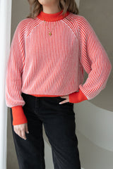 Knitted sweater stripes pink red