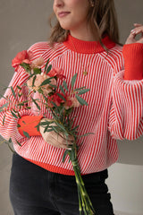 Knitted sweater stripes pink red
