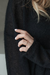 Alpaca-blend knitted sweater in black