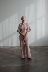 Jumpsuit Puder aus Musselin mit Schleife