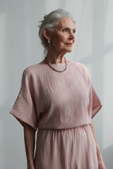Jumpsuit Puder aus Musselin mit Schleife